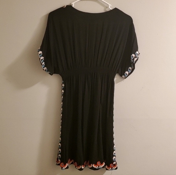 NESLAY Paris Black Midi Dress With Native American Style Adorning The Hemline - Picture 2 of 5